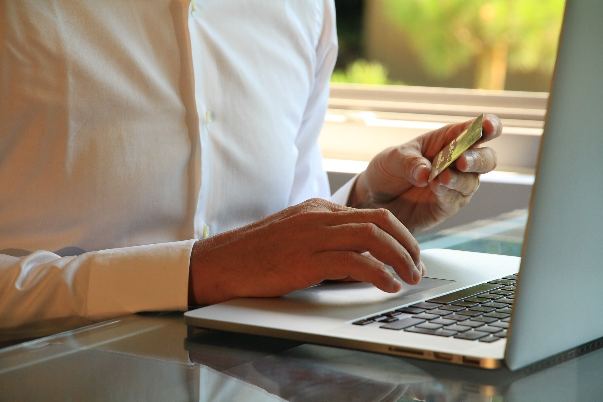 paying on a laptop