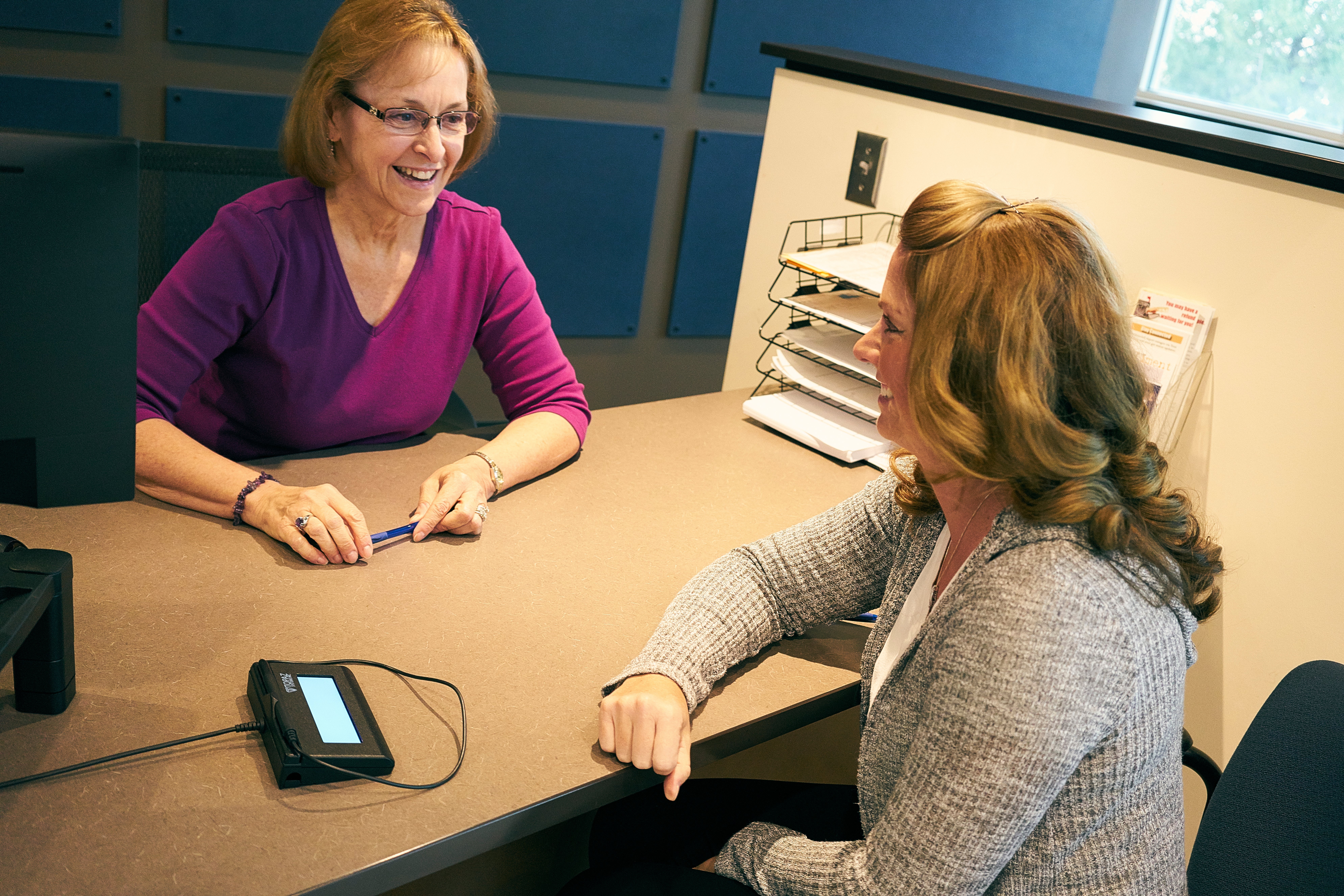 Two women at a bank