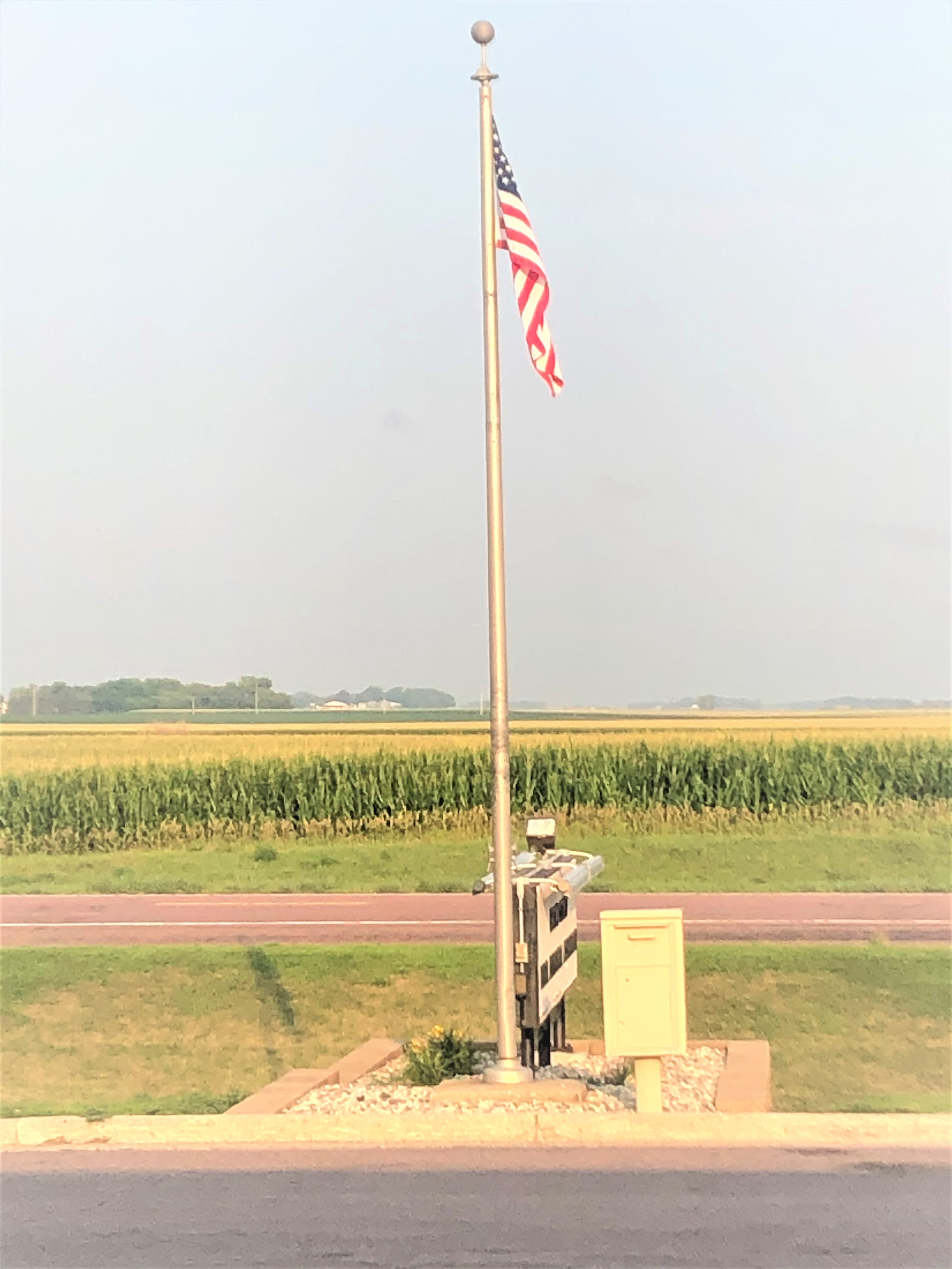 Flag in front of a field